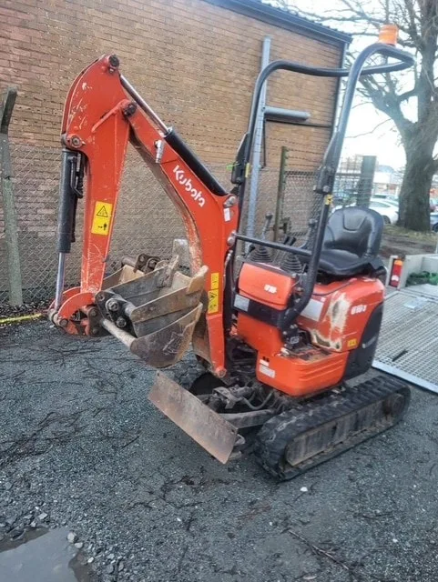 Kubota mini digger in depot yard